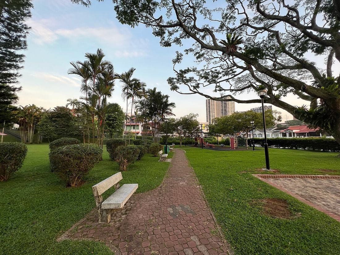 A park path with a bench